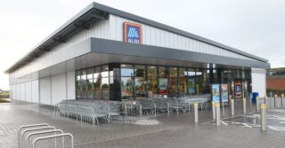 shop more sustainably - Outside view of Aldi store front
